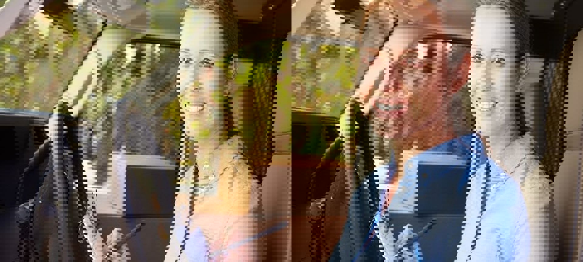 Woman Facing Camera Smiling Sitting In Van Delivering Min
